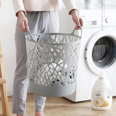 China Household Woven Rattan Laundry Basket rattan like woven hollow plastic dirty clothes basket also for toy storage for sale