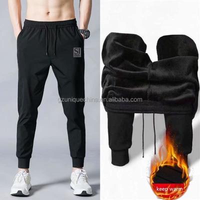 China Other OEM latest winter black warm fleece thick joggers for men for sale