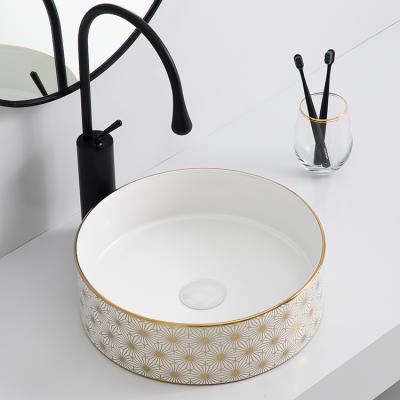 China New Arrival Modern Design Paper Sink Gold Transfer Luxury Bathroom Ceramic Art Basin for sale