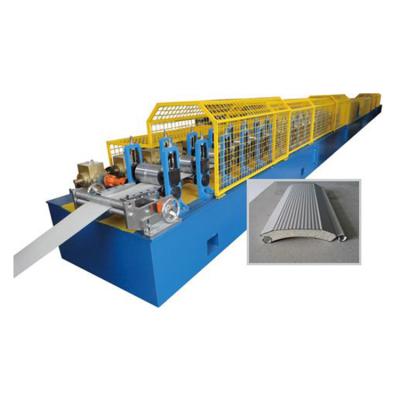 China Building Material Shops Roller Shutter Door Equipment European Type Roll Forming Making Machine for sale