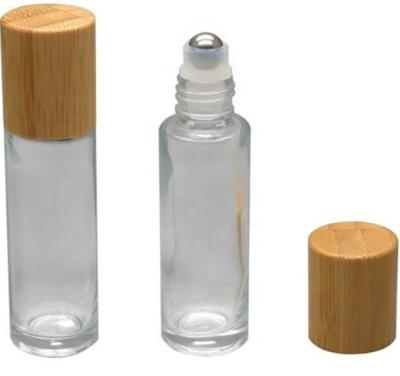 China Personal care 10ml 15ml bamboo glass lid roll on bottle roll perfume bottle/essential glass bottle /roll on bottle with bamboo lid for sale