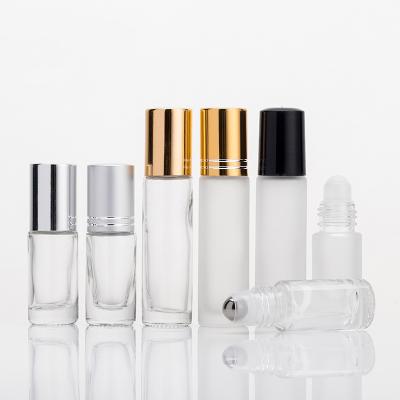 China Personal Skin Care Packaging 5ml 8ml 10ml Clear Frosted Glass Roll On Bottle For Essential Oil / Amber Perfume Glass Bottle With Gold Silver Top Cap for sale