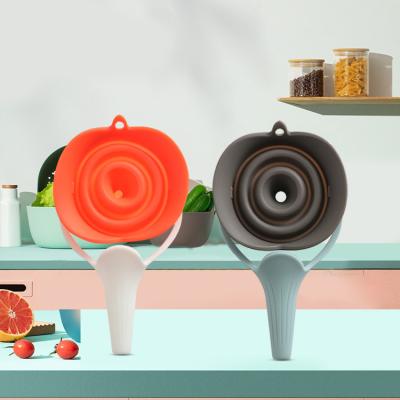 China New Viable Multi Function Multi Color Silicone Food Grade Kitchen Collapsible Funnel for sale