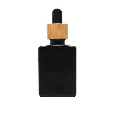 China 30ml 50ml Essential Oil Cosmetic Use Square Dropper Bottle With Glass Dropper for sale