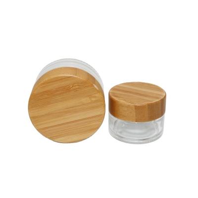 China 5 Cosmetic Containers Real Face Oil Bamboo Wooden Lid Skin Care Empty Glass Cosmetic Jar Packaging 15 30 50 100g For Face Cream for sale