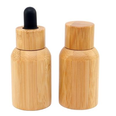 China Custom 5ml 10ml 15ml 20ml 30ml 50ml 100ml Essential Oil Cosmetic Glass Face Oil Packaging Bamboo Dropper Bottle for sale