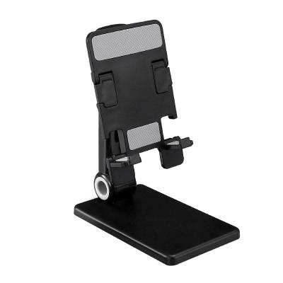 China Portable Adjustable Foldable Plastic Adjustable Cell Phone Accessories Table Top Mobile Phone Video Holder for sale