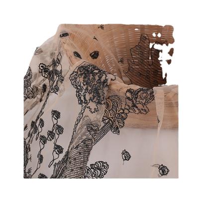 China Spot deep apricot bottom black line embroidery fabric forest embroidery dress fashion three-dimensional embroidery cloth for sale