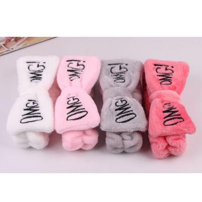 China Sweet Sandro Spa Headband Winter Fleece Bow Letter Hair Band Girls Face Wash Makeup Fur Headband Women for sale