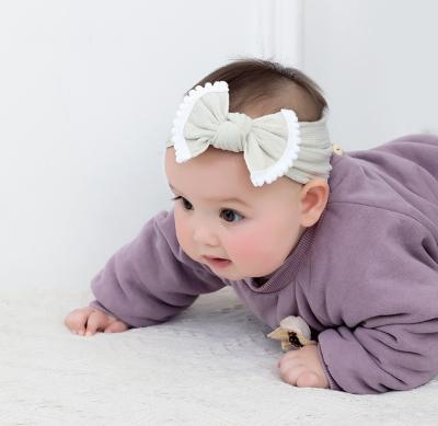 China Sandro Kids Hairband Hair Accessories Wholesale Eco-friendly Knotted Nylon Headband Jacquard Baby Headband for sale