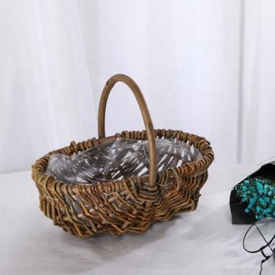 China Desk Organizer Bridesmaid Viable Oval Handwoven Basket Picnic Wicker Basket for sale