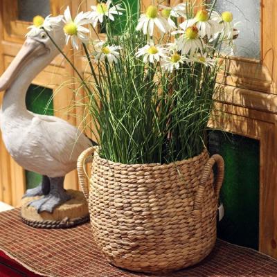 China Modern Home Decor Planter Pot Water Hyacinth Weave Plant Pot Storage Basket Indoor Laundry Baskets Viable With Handles for sale