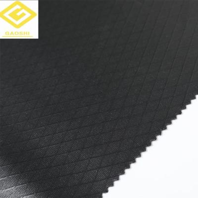 China Waterproof Bag Material 100% Polyester Tape Coated Oxford Embossed Luggage Lining Fabric for sale