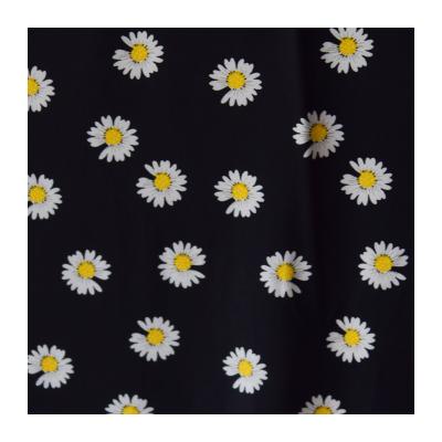 China SHAOXING FACTORY COSTOMIZE Shrink-resistant TO DESIGN FDY SUNFLOWER ON A BLACK BACKGROUND IN PRINTED POLYESTER KNIT SPANDEX FABRIC for sale