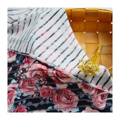 China Stretch outlet China manufacturer 150gsm poly spandex burnt dty knit fabric with paper printing fabric for blouse for sale