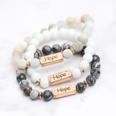 China TRENDY Cheap Price Lava Stones Bead Bracelet Elastic Natural Size with HOPE engrave bracelet for DIY lover's Logo Jewelry customer for sale