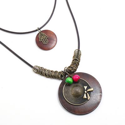 China 2020 New Vintage Jewelry Vintage Wooden Buddha Charm Necklace But Women Pendant Necklace for sale