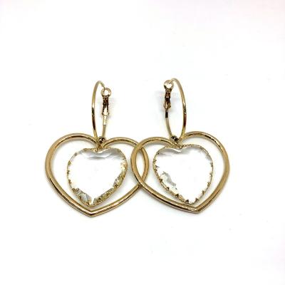 China Gold Cute Hollow Love Fashion and Beautiful Exaggerated Soft Earring Designer Personality Crystal Light Luxury French Earrings for sale