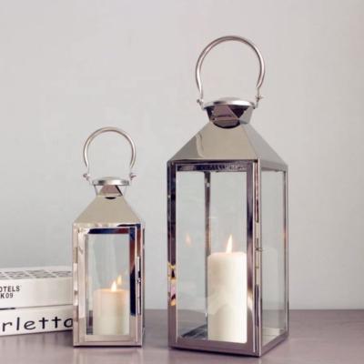 China Eco-friendly Stainless Steel Glass Gold Lantern Metal Candle Holder Wedding Hanging Decor for sale