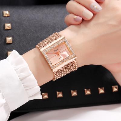 China 2021 New Design Hip Hop Rich Ladies Statement Chain Watch Fashion Luxury Wrist Watch Cheap for sale