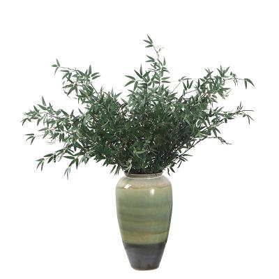 China Mini Bamboo Leaf For Wholesale Artificial Leaves Wedding Home Decotation Simple Outdoor Home Decoration for sale