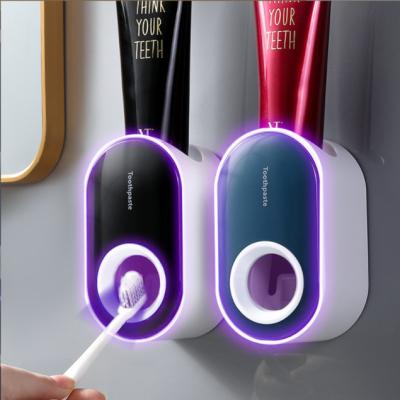 China High Quality Automatic Household Toothpaste Dispenser Bathroom Wall Mounted Toothpaste Stocked Squeezer for sale