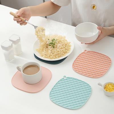 China Ambient Stored Heat Resistant and Reusable TPR Mat Drink Cup Coasters Pot Holder Table Non-Slip Place Mat for sale