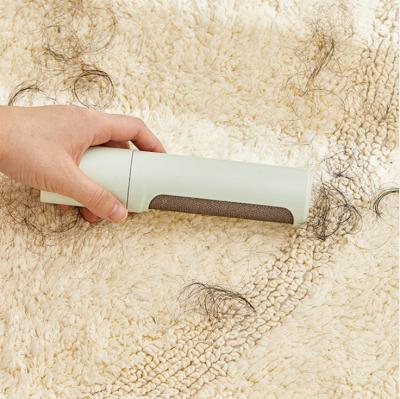 China New Manual Spinning Pet Hair Fiber Rollers Clothes Furniture Carpet Cleaning Brush Portable Fuzz Fabric Fiber Remover for sale