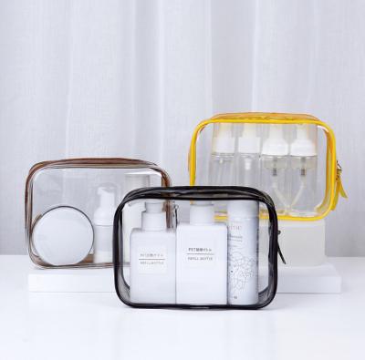 China Wholesale Transparent Waterproof Cosmetic Pouch Bag Clear PVC Beach Fashion Travel Toiletry Toiletry Bag With Handle for sale