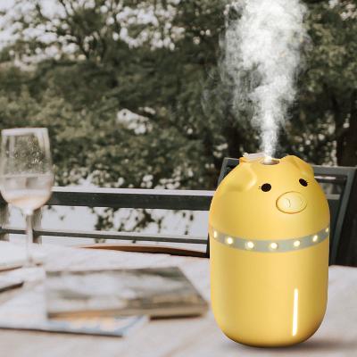 China Popular Mini Car Humidifier Portable Cooper with Fan Pig Style Car Jet Diffuser Humidifier and Lamp Function for Office and Car for sale