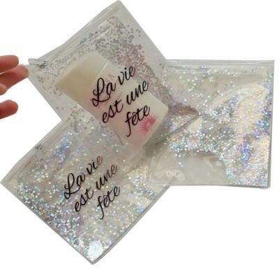 China Recyclable Clear PVC Sequin Bag Sand Glitter Makeup Bag Star Glitter Small PVC Zipper Pouch for sale