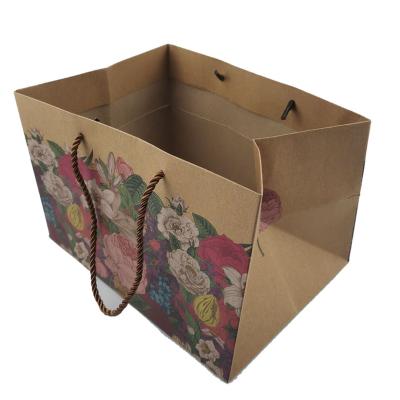 China Recyclable Shopping Customize Design Kraft Paper Shopping Bag Printing With Your Own Logo for sale