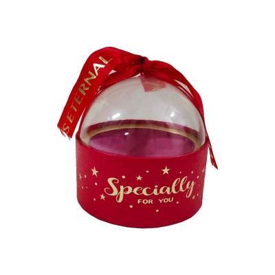 China Christmas handmade luxury round gift boxes with ribbon designs for sale