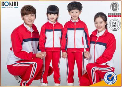 China Uniforme escolar de encargo del color del diseño rojo y blanco de la chaqueta para la reunión de deporte en venta