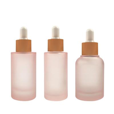 China 10ml cosmetic 15ml 20ml 30ml 50ml 100ml frosting glass dropper bottles cosmetic packaging customized lotion glass bottle for sale