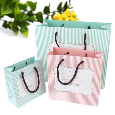 China Recycled Materials Jewelry Gift Bag Striped Cosmetic Small Paper Gift Bag Custom Clothing Shopping Portable Paper Bag for sale