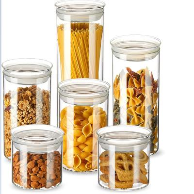 China Sustainable wholesale prodcued various sizes glass storage jar with sealing wood lids used for spaghetti, flour, coffee beans, snacks for sale