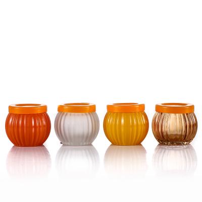 China Custom 80ml Morden Pumpkin Shape Luxury Glass Candle Jar Unique Style Candle Cup for sale