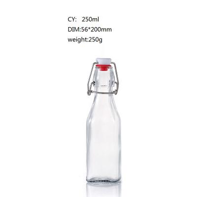 China Hot Selling Glass Beverage Bottles 250ml 500ml Empt Clear Square Beverage Bottle Good Quality for sale