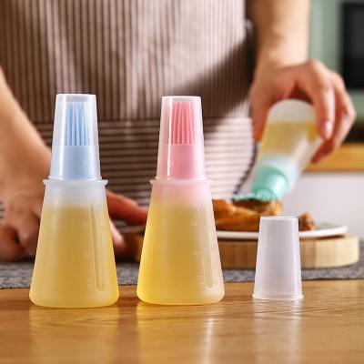 China High Temperature Resistant Silicone Oil Bottle Easily Cleaned With Brush Grill Liquid Oil Brush Pastry Kitchen BBQ Cooking Brush With Lid for sale