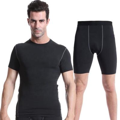 China QUICK DRY 2 Piece Set Short Sleeve Men Gym Training Fitness Shirt And Compression Shorts Sets Gym Wear for sale