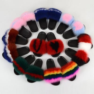 China Damping white gray home sandals black fox raccoon fur slippers colorful fluffy slippers wholesale for sale