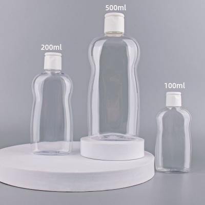 China Personal Care Bpa Free Clear Plastic Flat Squeeze 60Ml Empty Shampoo Shower Bottle With Flip Top Cap for sale