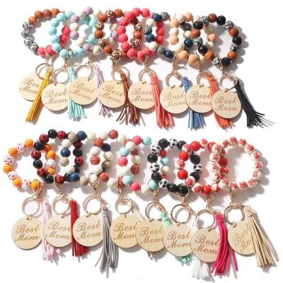 China Promotional Gift Wrist Bracelet Wooden Round Print Colorful Women Wooden Key Chain Bracelets for sale