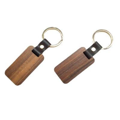 China Custom High Quality Environmentally Friendly Wood Opens Engrave Logo Wood Keychain Custom Made Wooden for sale