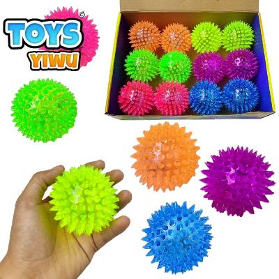 China Eco-Friendly Material Flashing Spike Balls Toys Squeeze LED Light Up String Strain Colored Bounce Balls For Kids Massasge Spike Balls Unisex Wholesale for sale