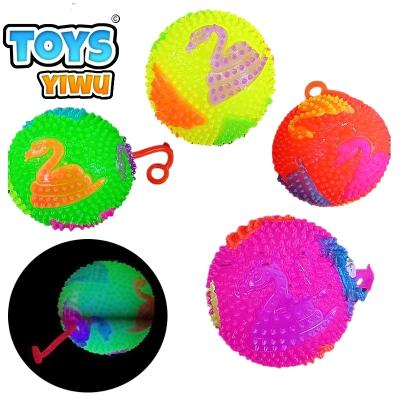 China Eco-Friendly Material Flashing Balls Toys 7.5cm LED Light Up Skull Design Stress Squeak Balls Bounce Massasge Spike Balls Unisex Wholesale for sale