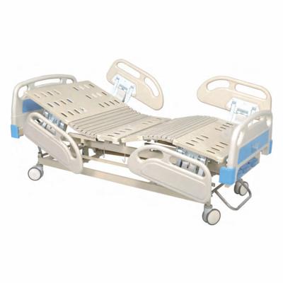 China Cama de hospital manual de tres manijas con barandillas de PP de cuatro plegados en venta