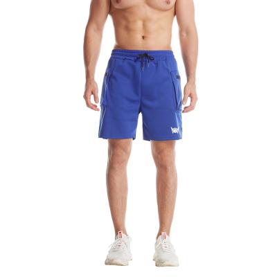 China Anti-wrinkle men's swim shorts solid simple blue men's logo swim trunks beach quick dry outdoor thin shorts customized colors for sale