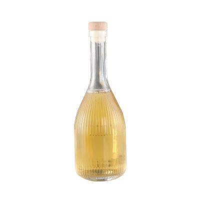 China Empty Transparent Beverage Glass Bottle Fruit Juice Frosted Ice Wine Glass Bottle With Cork for sale